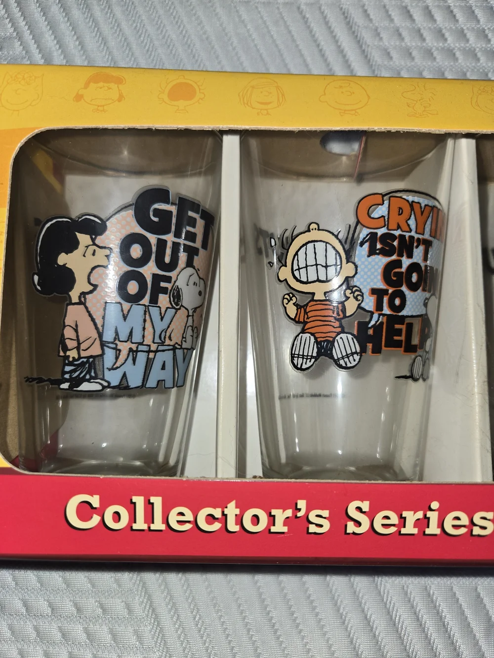 Peanuts Pint Glass 4-Pack — Yellow, Black, Orange, Green Graphics
